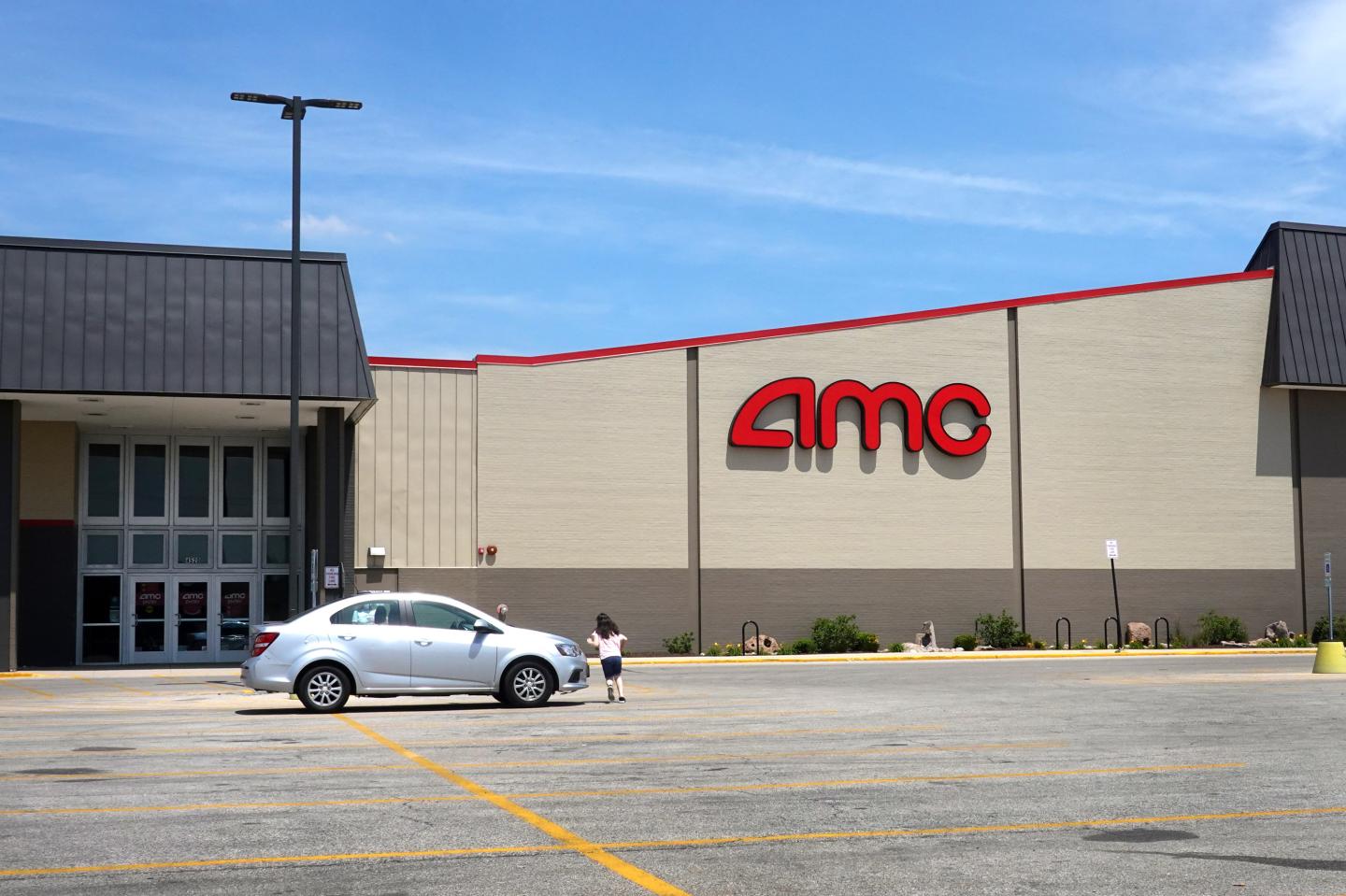A sign hangs outside of an AMC theater on June 01, 2021 in Norridge, Illinois.