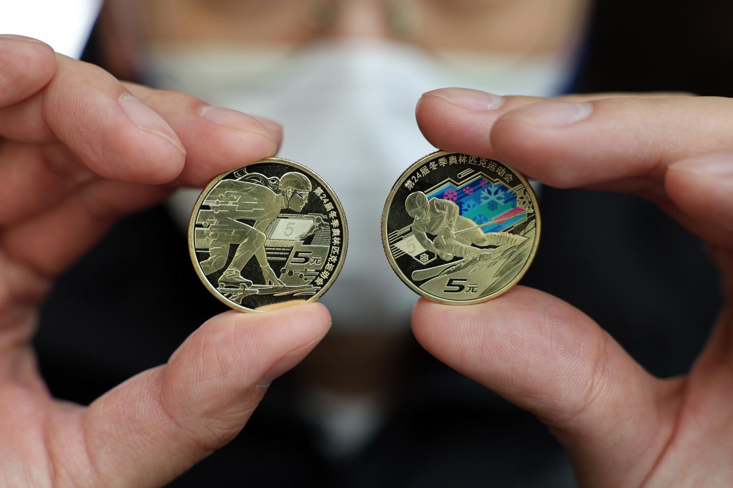 China has issued copper-alloy commemorative coins for the 2022 Beijing Winter Olympics. But will there be boycotts of the games?