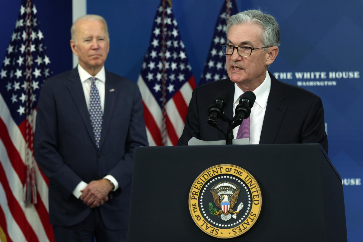 President Biden stands next to Fed pick Jerome Powell