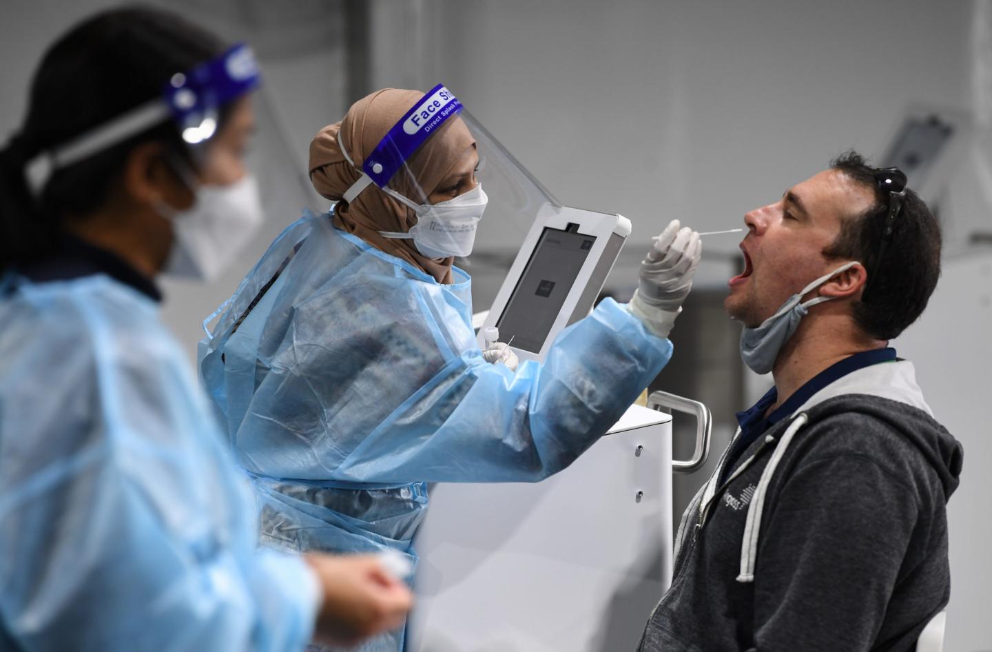 High vaccine rates could limit the economic fallout of Omicron across Asia—but there’s one big caveat