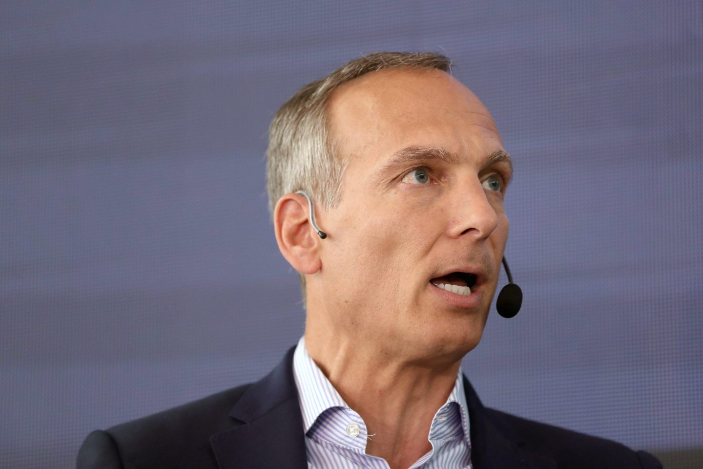 Glenn D. Fogel, CEO of Booking Holdings, speaking at a Bloomberg technology summit in 2018. The economic impact of COVID on the hotel industry “compounds the challenge of taking urgent action to address climate change,” Fogel writes.