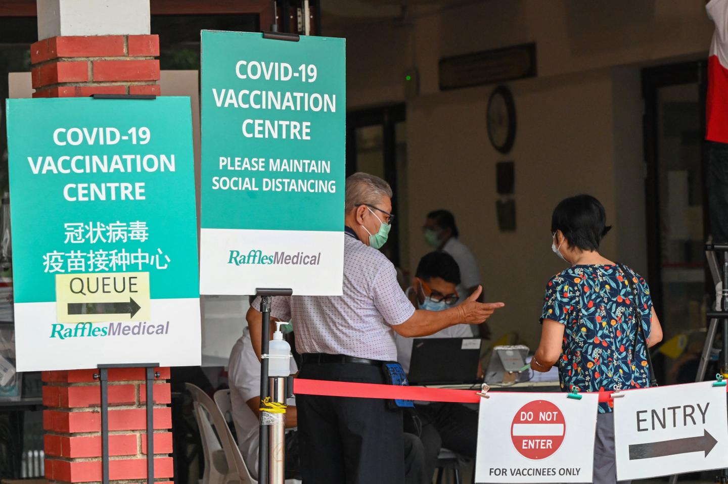 Singapore finds two breakthrough Omicron cases in residents who got COVID booster shots