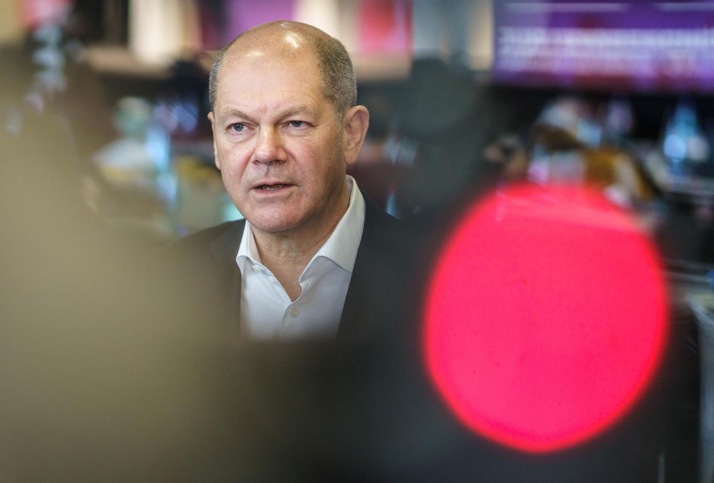 SPD candidate for chancellor Olaf Scholz talks to media representatives on the fringes of the federal Jusos congress.