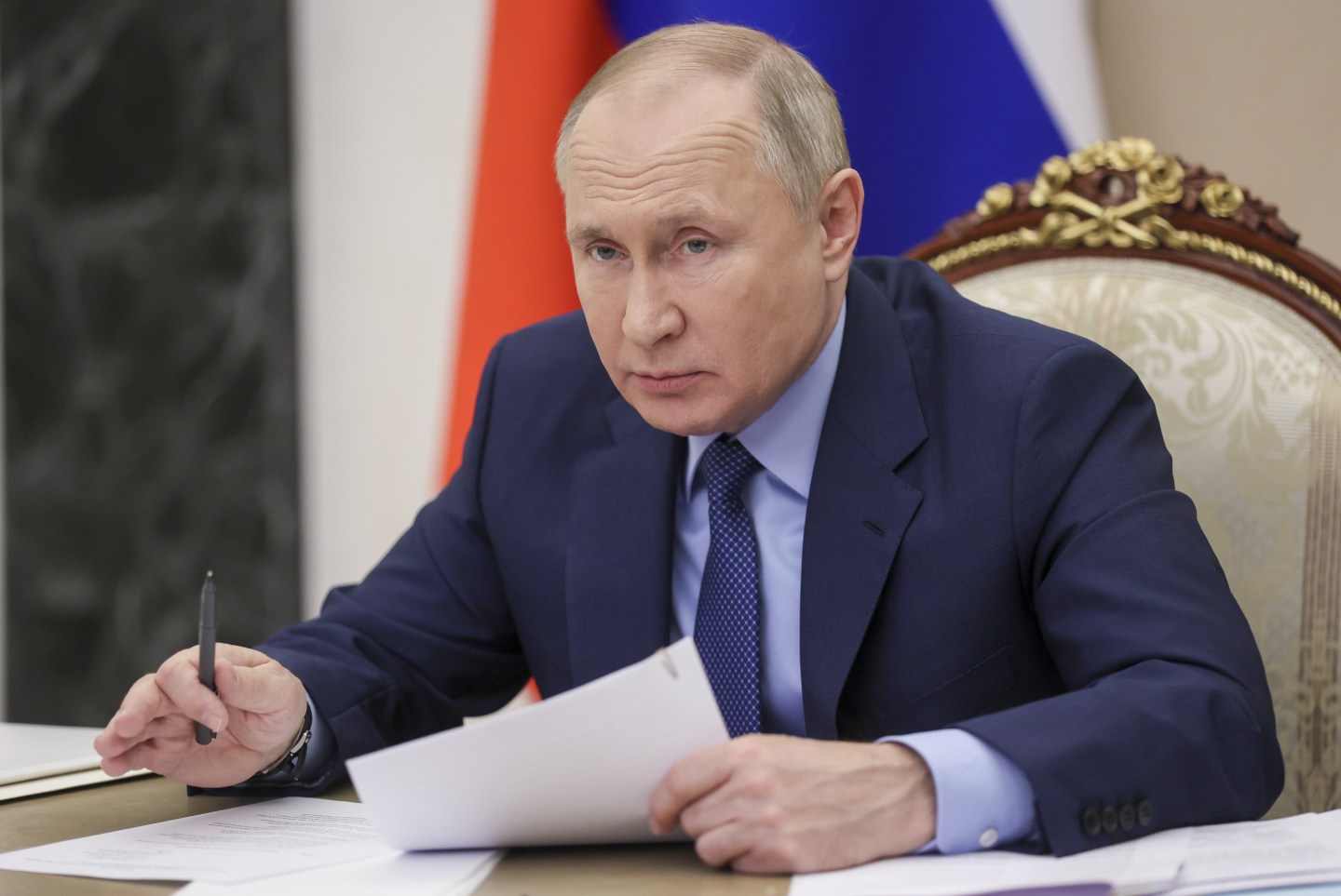 Russia's President Vladimir Putin is seen in his office in the Moscow Kremlin during a video conference meeting on the current situation in the coal industry in Russias Kemerovo Region (Kuzbass).