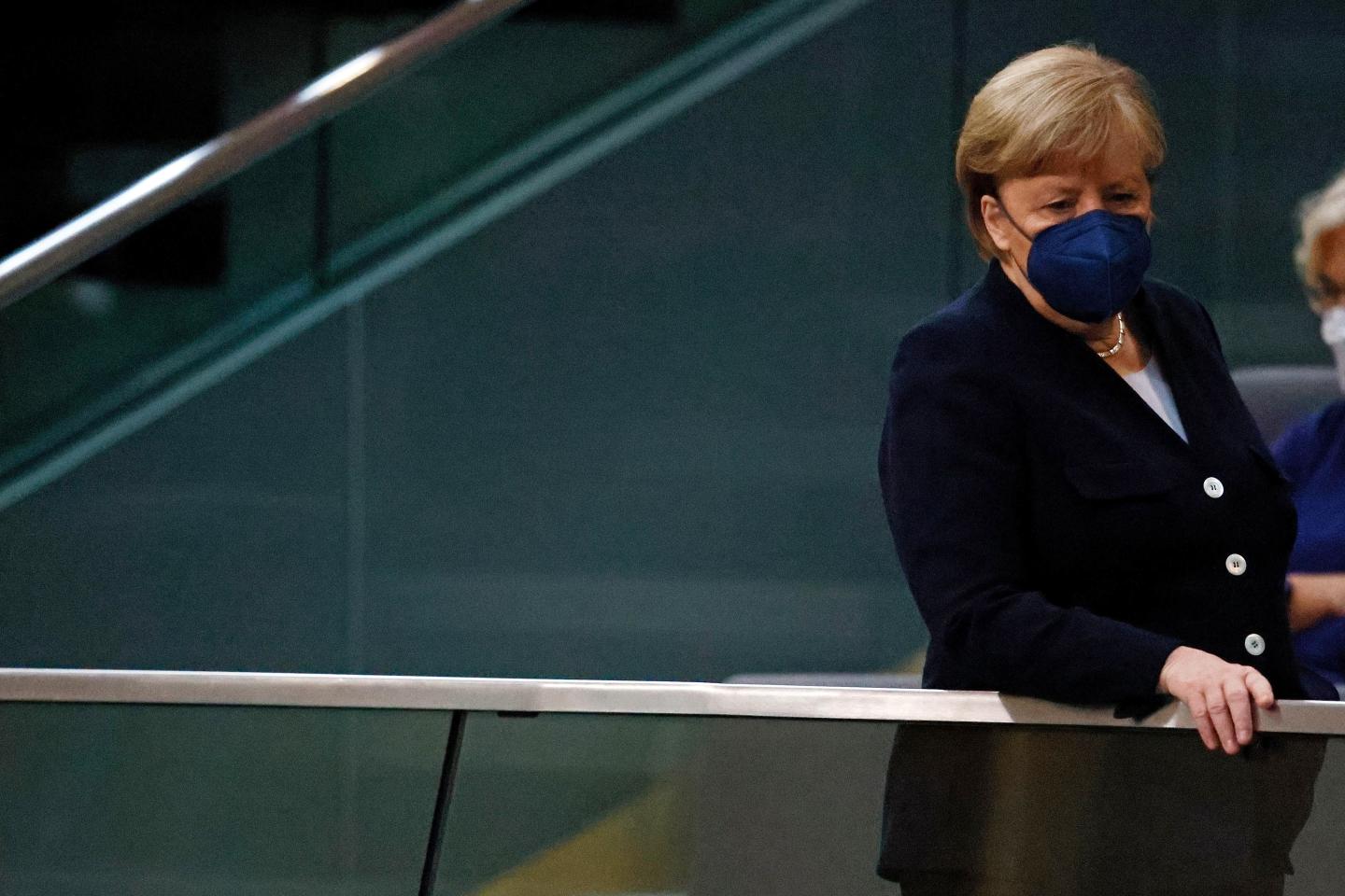 Angela Merkel’s 16-year rule ends as German parliament elects Olaf Scholz chancellor