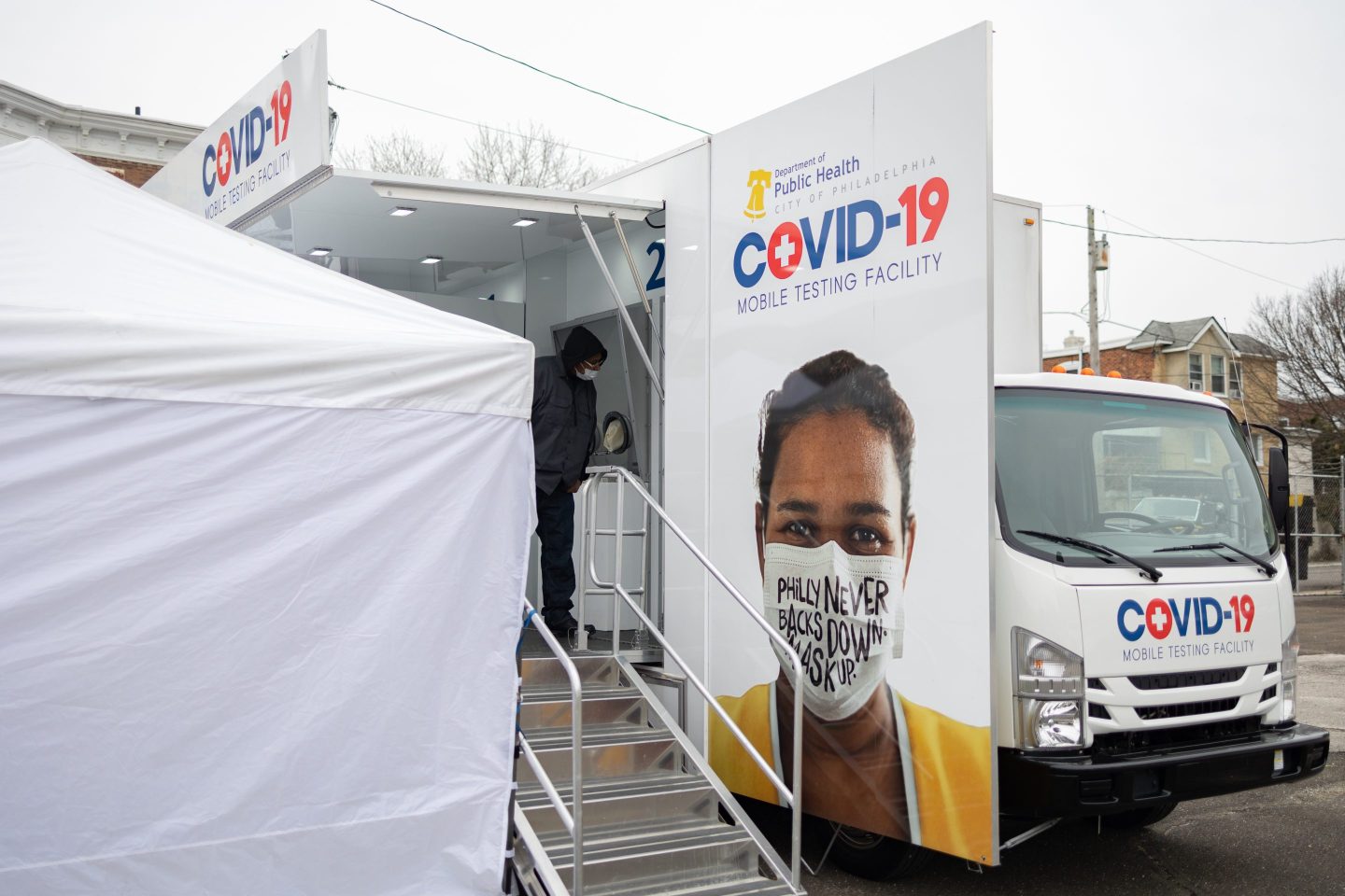 A Philadelphia Department of Public Health mobile Covid-19 testing site in Philadelphia, Pennsylvania, U.S, on Wednesday, Dec. 8, 2021. The earliest studies on omicron are giving cause for cautious optimism: While vaccines may be less powerful against the new variant, protection can be fortified with boosters. Photographer: Hannah Beier/Bloomberg via Getty Images
