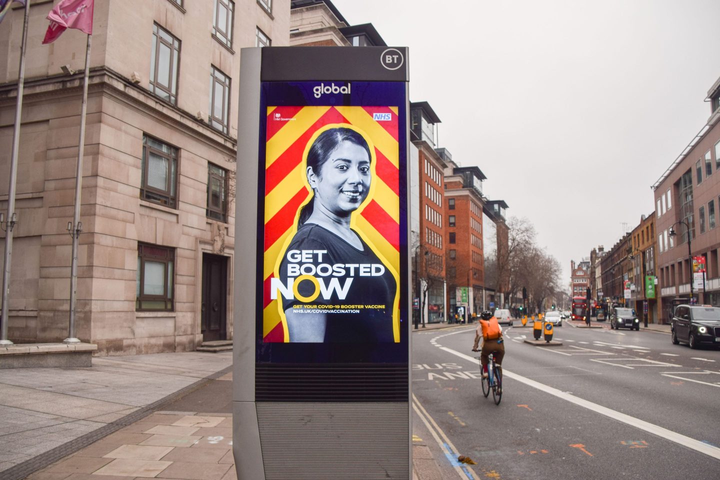 An electronic screen in London urges everyone to get a booster shot.