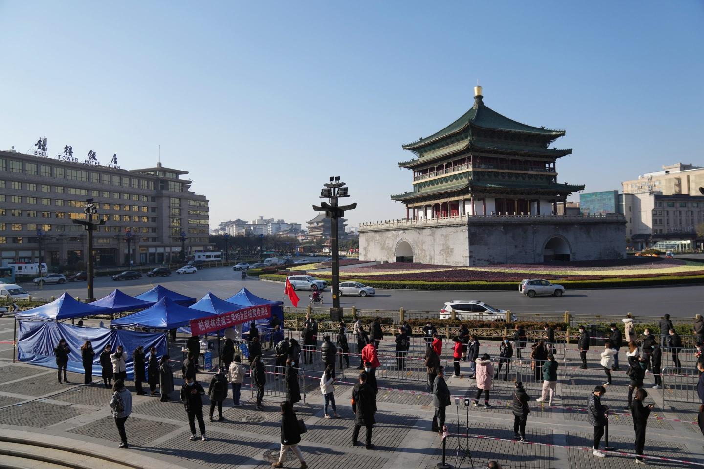China tells 13 million Xi’an residents to stay at home after mass testing finds 127 COVID cases