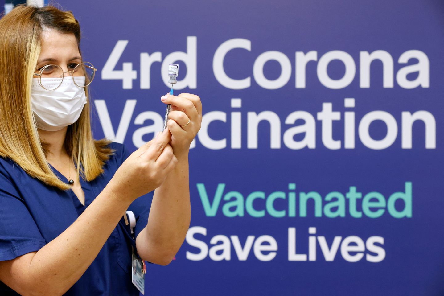 A medic prepres a dose of the Pfizer-BioNTech vaccine against the coronavirus, to be used as a fourth shot, at the outpatient clinics of the cardiovascular centre at Sheba Medical Center in Ramat Gan, near the Israeli coastal city of Tel Aviv, on December 31, 2021. &#8211; Israel started giving fourth Covid vaccine shots today, to people with weakened immunity, becoming one of the first countries to do so, as cases surge driven by the Omicron variant. (Photo by JACK GUEZ / AFP) (Photo by JACK GUEZ/AFP via Getty Images)