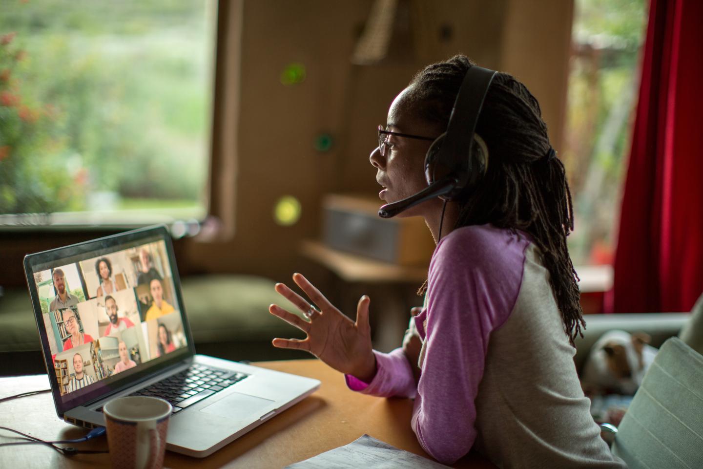 Photo of woman on Zoom on a laptop