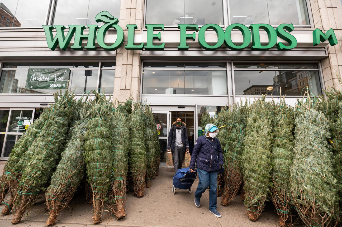 Christmas trees outside Whole Foods.
