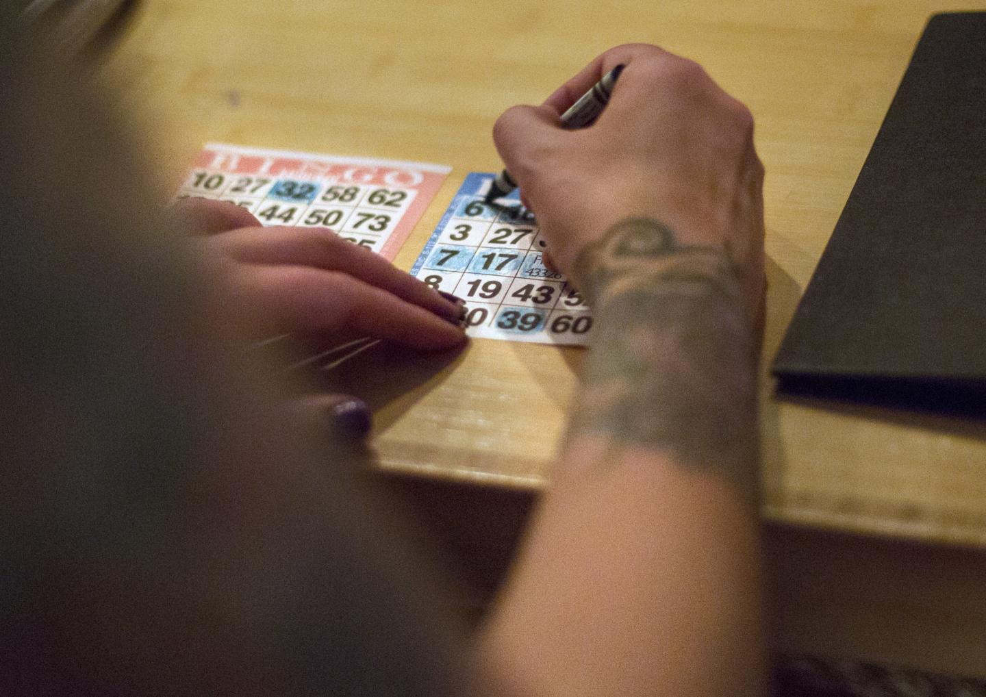 A person playing a game of bingo.