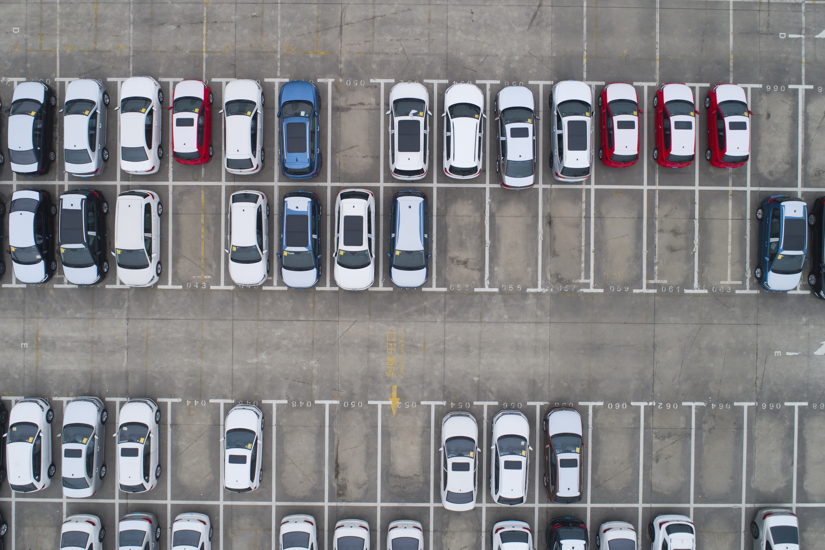 Aerial photo of cars in parking lot
