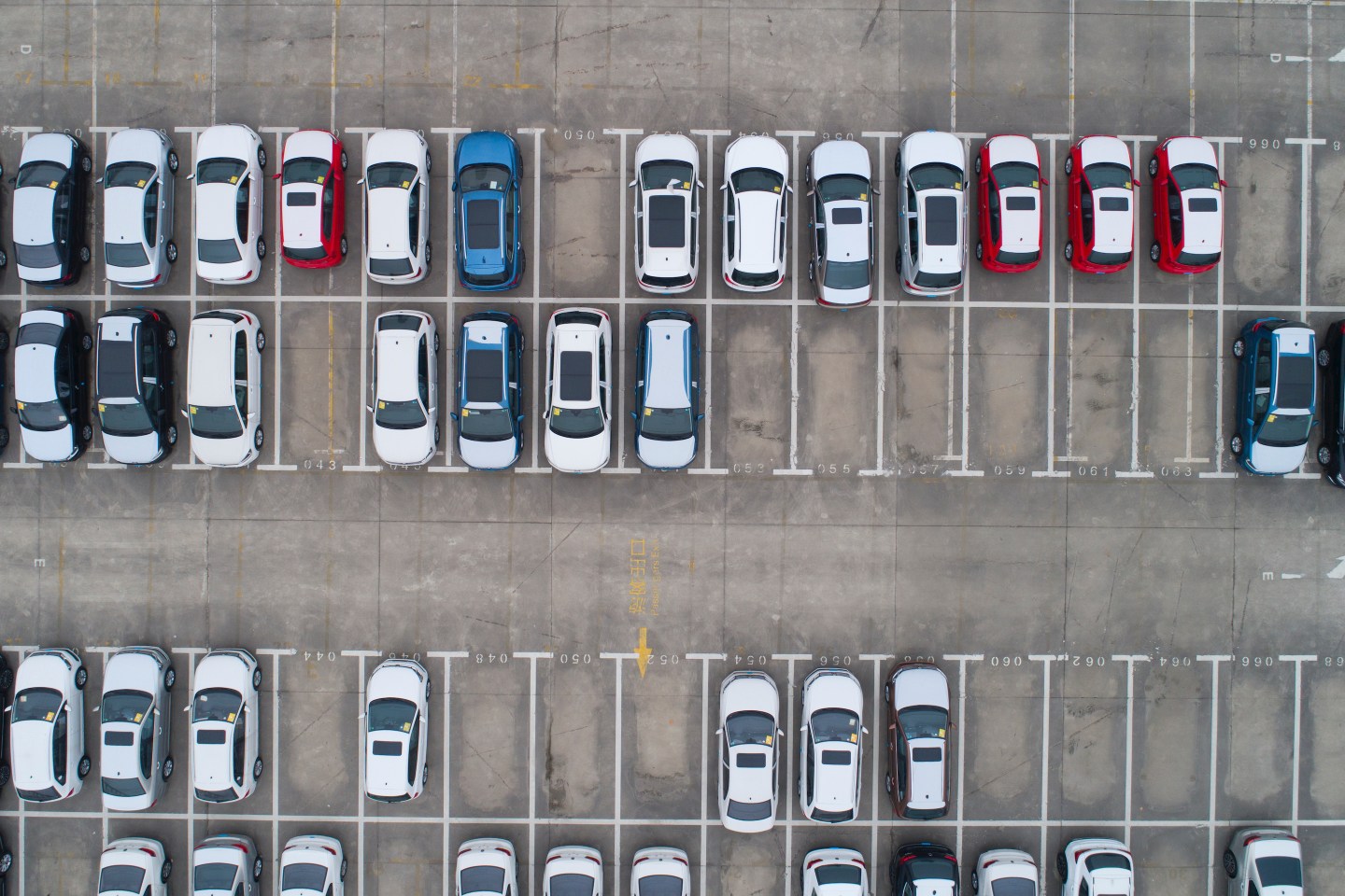 Aerial photo of cars in parking lot