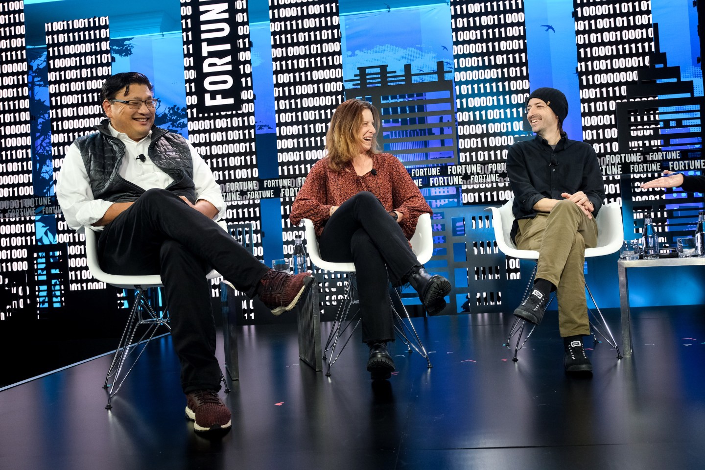 Photo of Hans Tung, Kara Nortman, and Nabeel Hyatt onstage at Coins2Day Brainstorm Tech 2021.