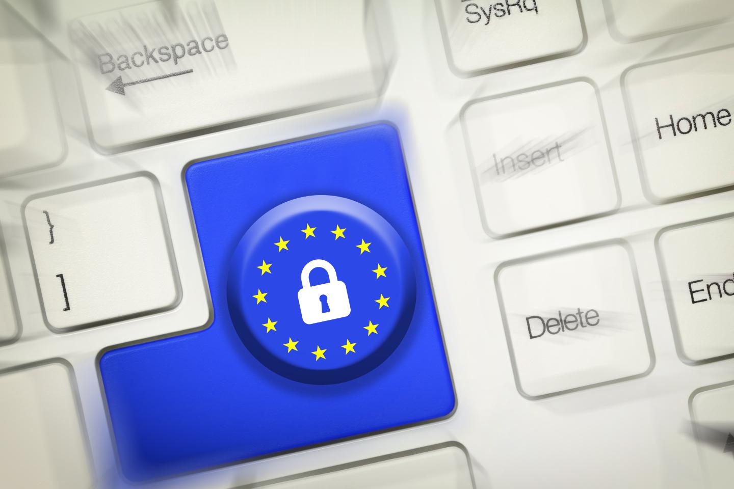 Photograph of blue lock key on keyboard