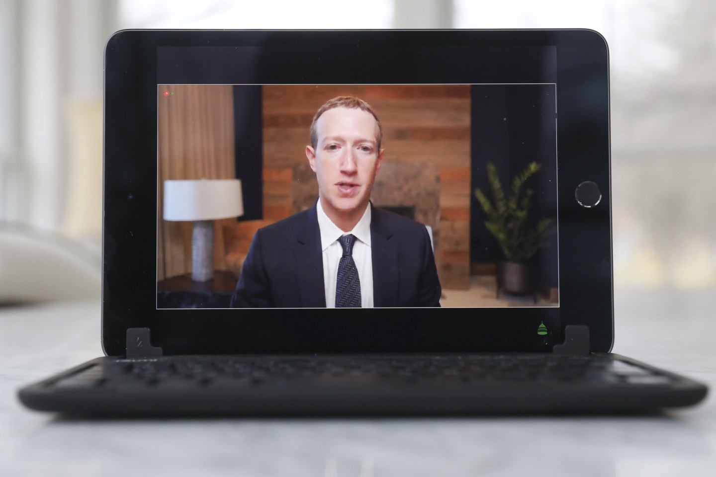 Mark Zuckerberg, chief executive officer of Facebook Inc., speaks virtually during a House Energy and Commerce Subcommittees hearing on a laptop computer in Tiskilwa, Illinois, U.S., on Thursday, March 25, 2021.