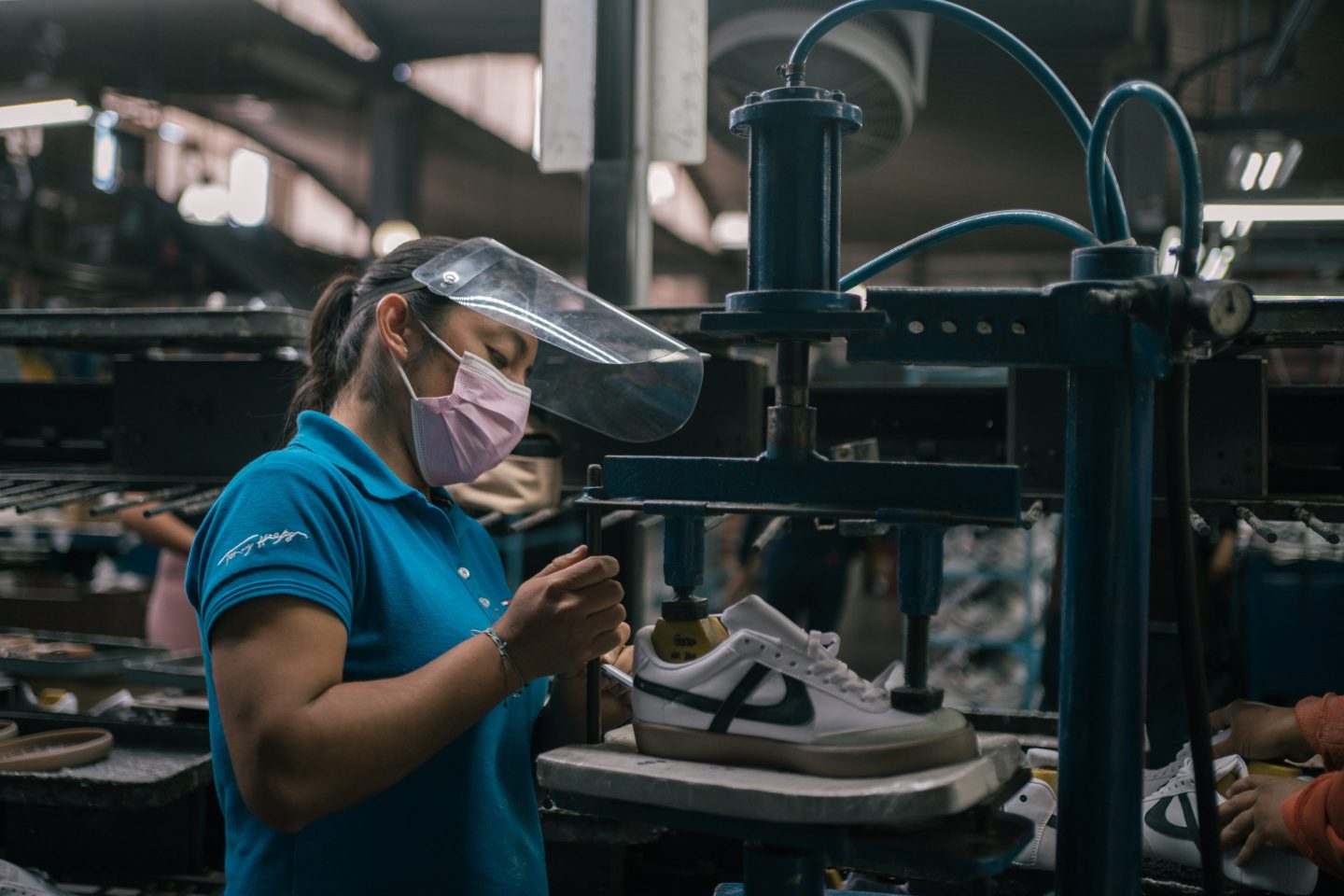A worker in a sneaker factory in Mexico