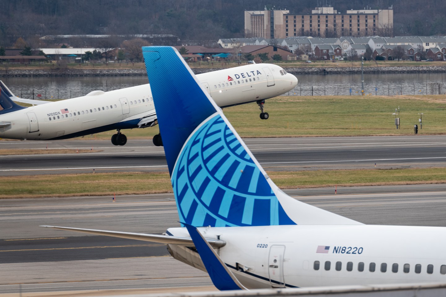 A Delta Air Lines plane takes off in Arlington, Va.