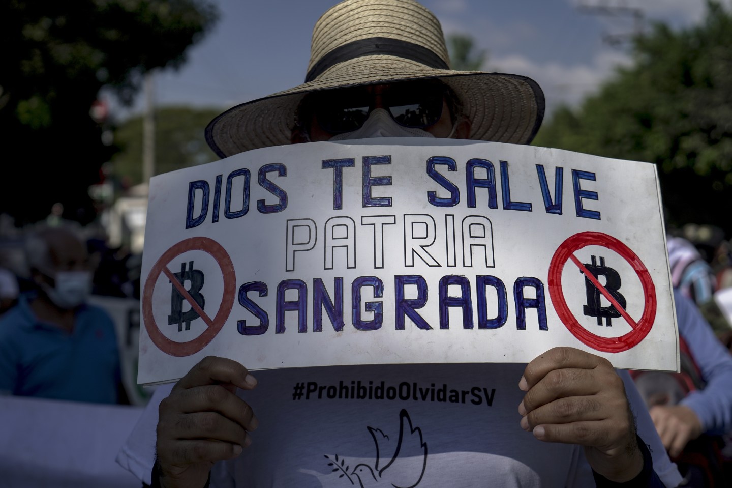 A sign protesting the Bitcoin law in El Salvador.