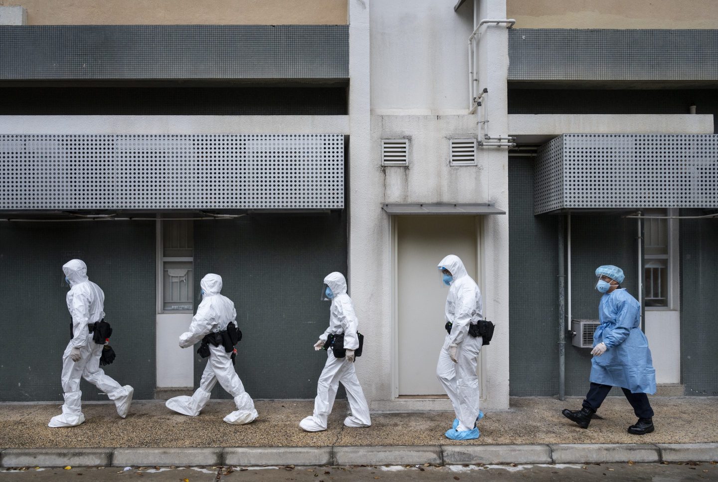 Police officers wearing personal protective equipment in Hong Kong