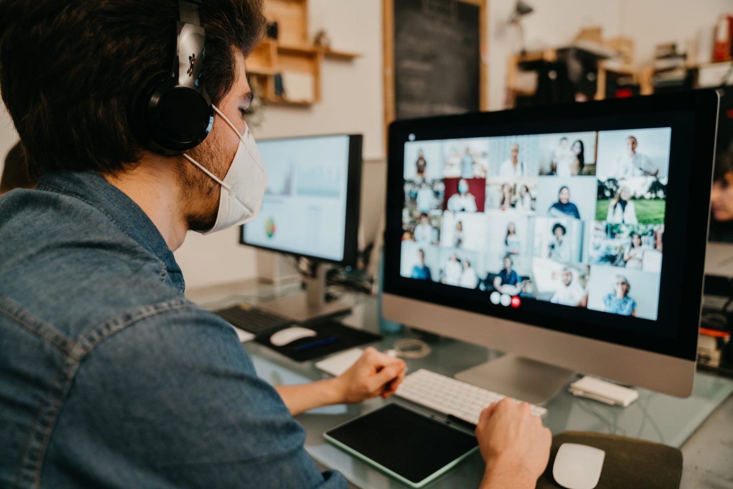 Young man participating in online class