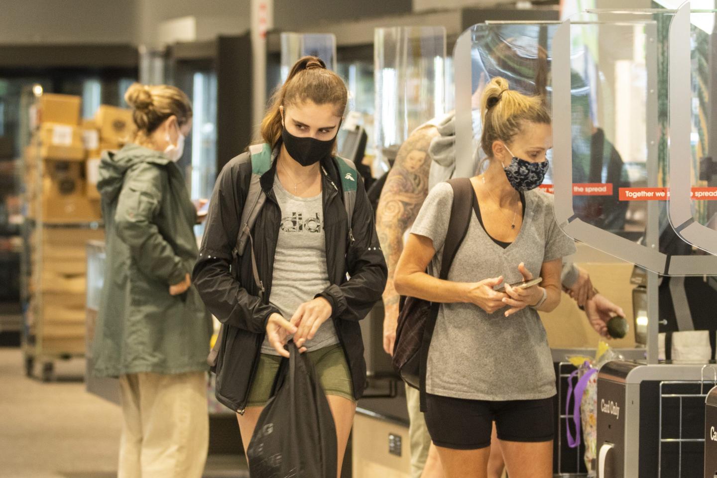 Sydney shoppers see empty supermarket shelves as an Omicron wave forces staff to isolate
