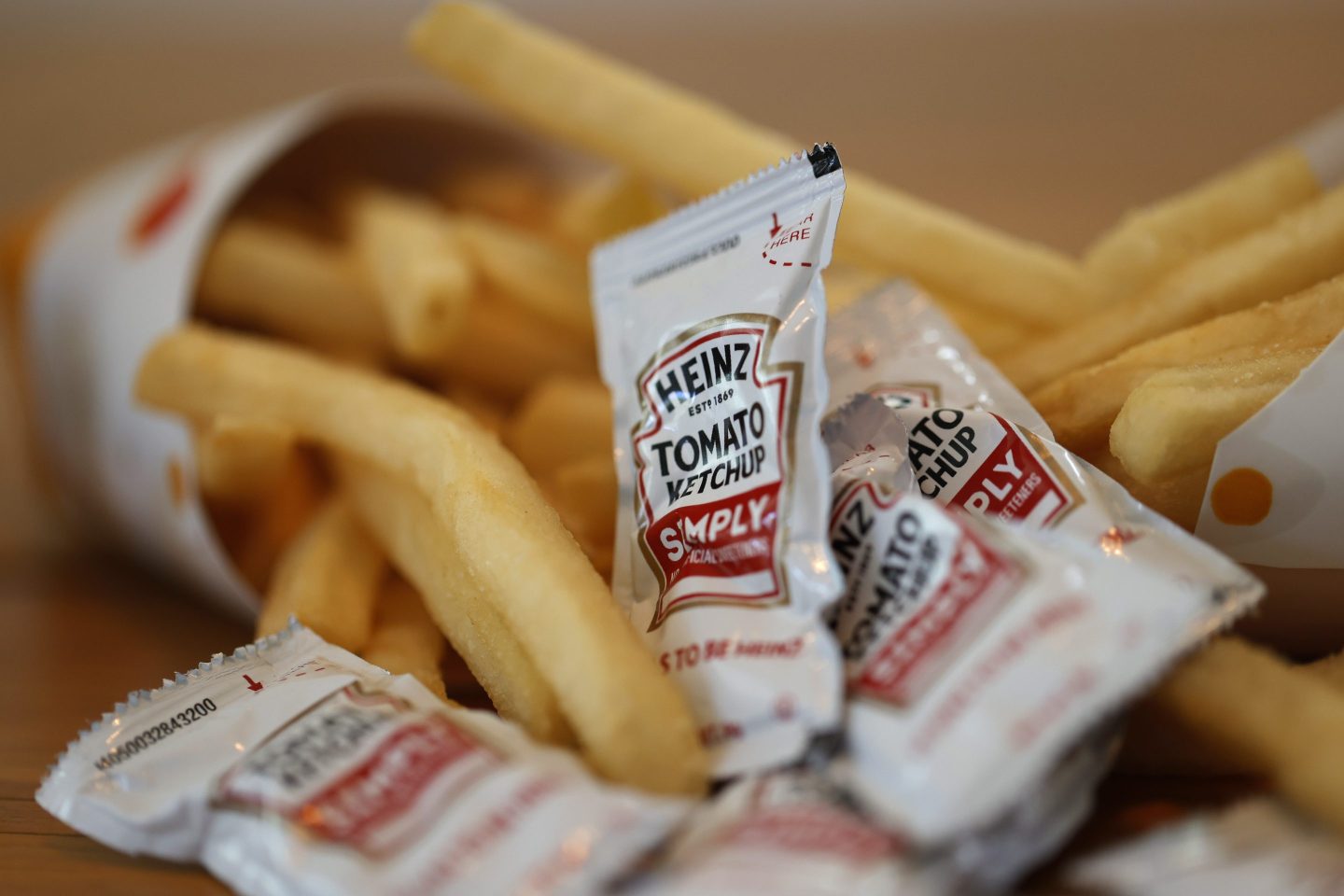 Packets of ketchup and french fries.