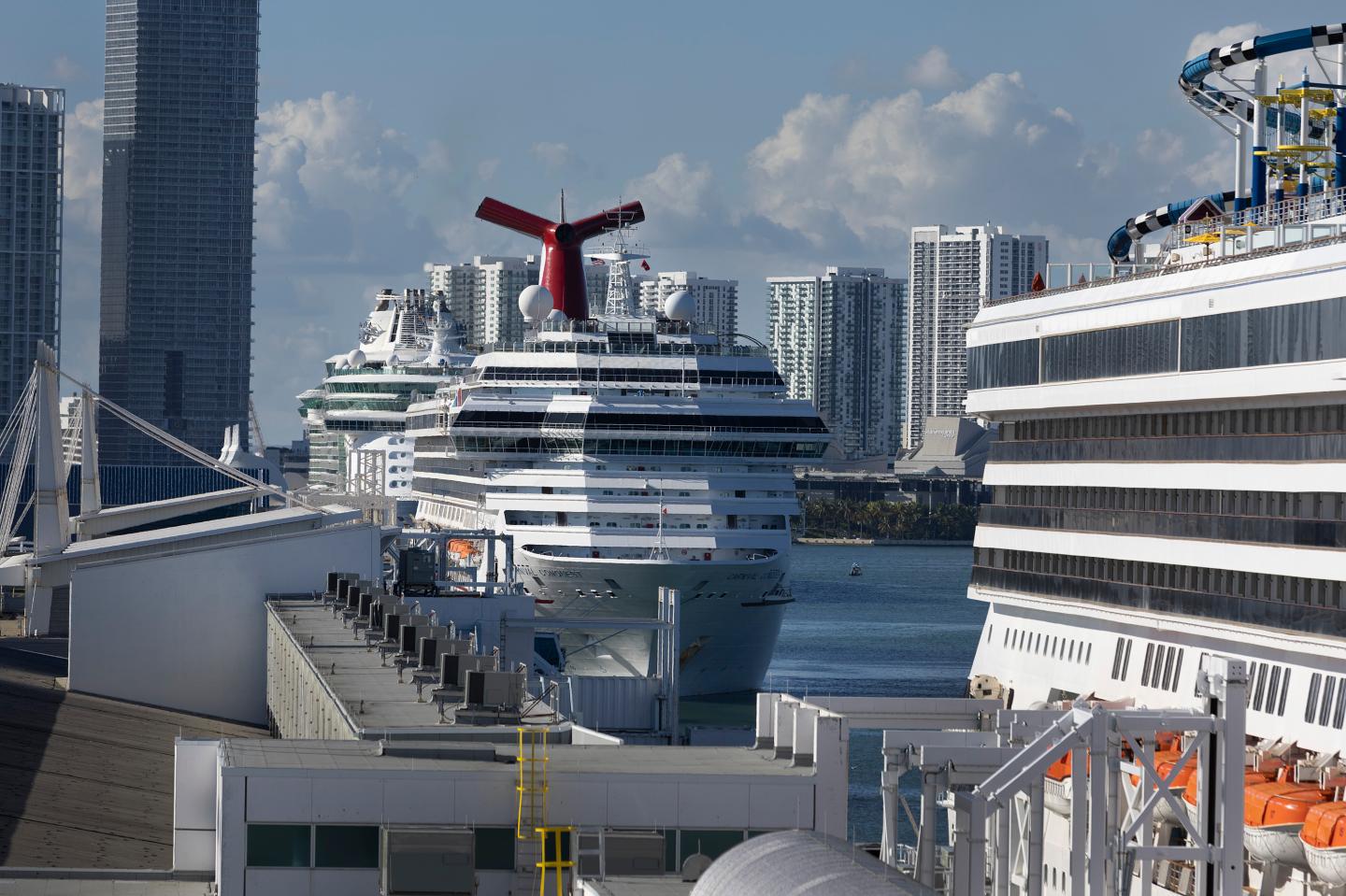 Cruise ships wait for passengers to embark before leaving PortMiami on December 31, 2021 in Miami, Florida.
