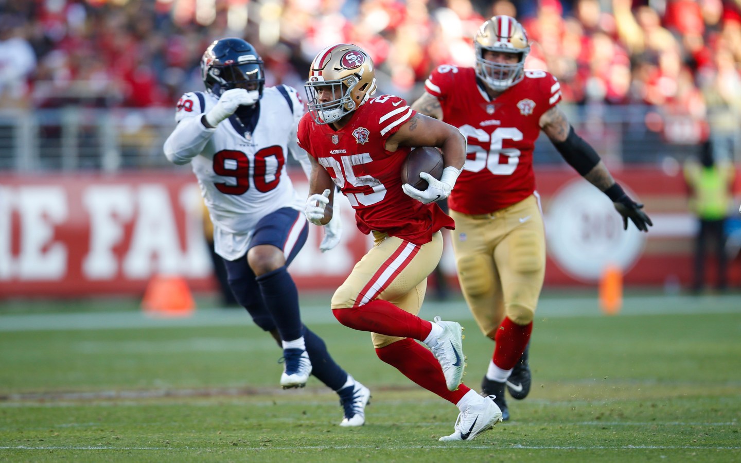 Elijah Mitchell #25 of the San Francisco 49ers rushes during the game against the Houston Texans at Levi's Stadium on January 2, 2022 in Santa Clara, California.