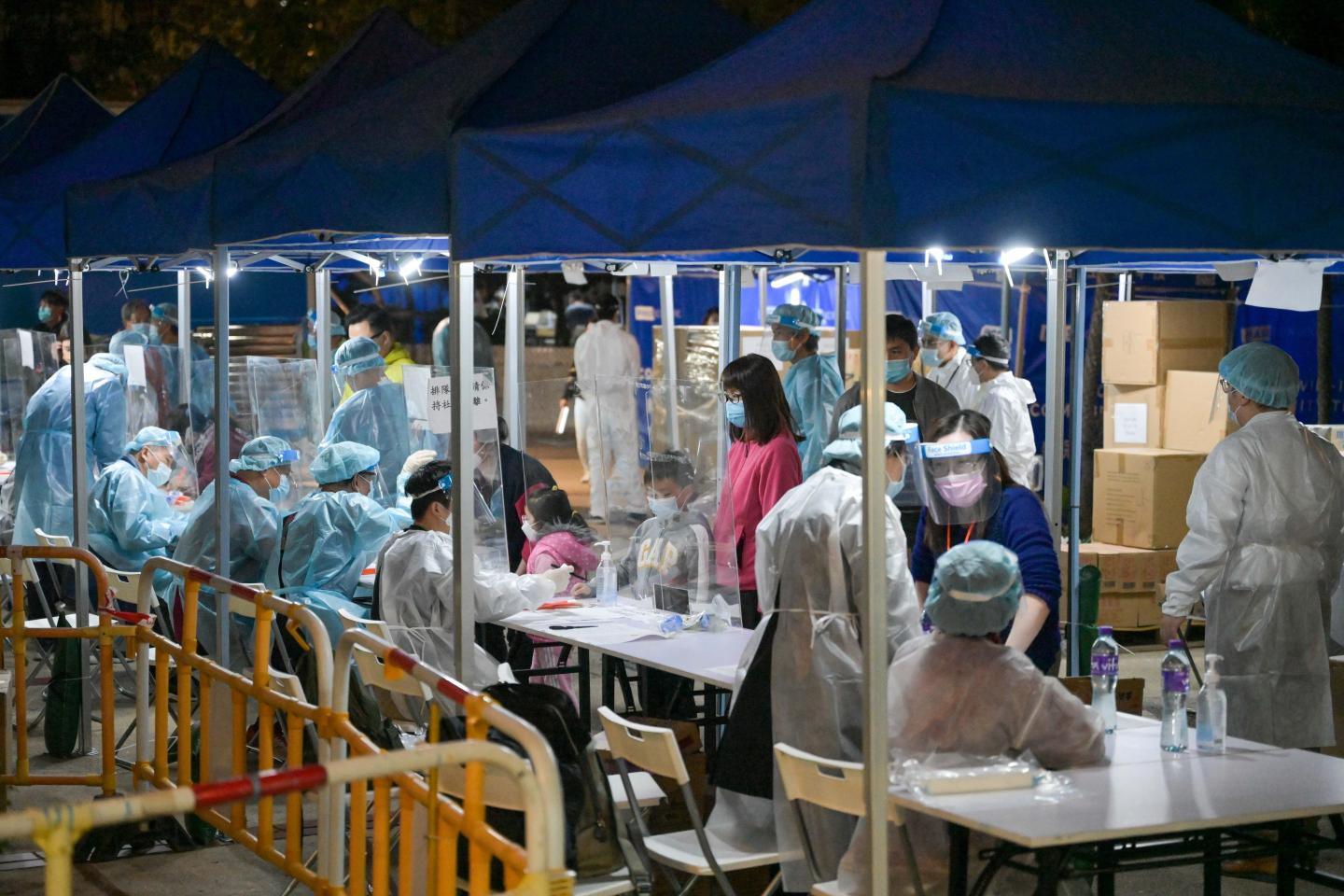 Hong Kong residents after receiving a COVID-19 test.