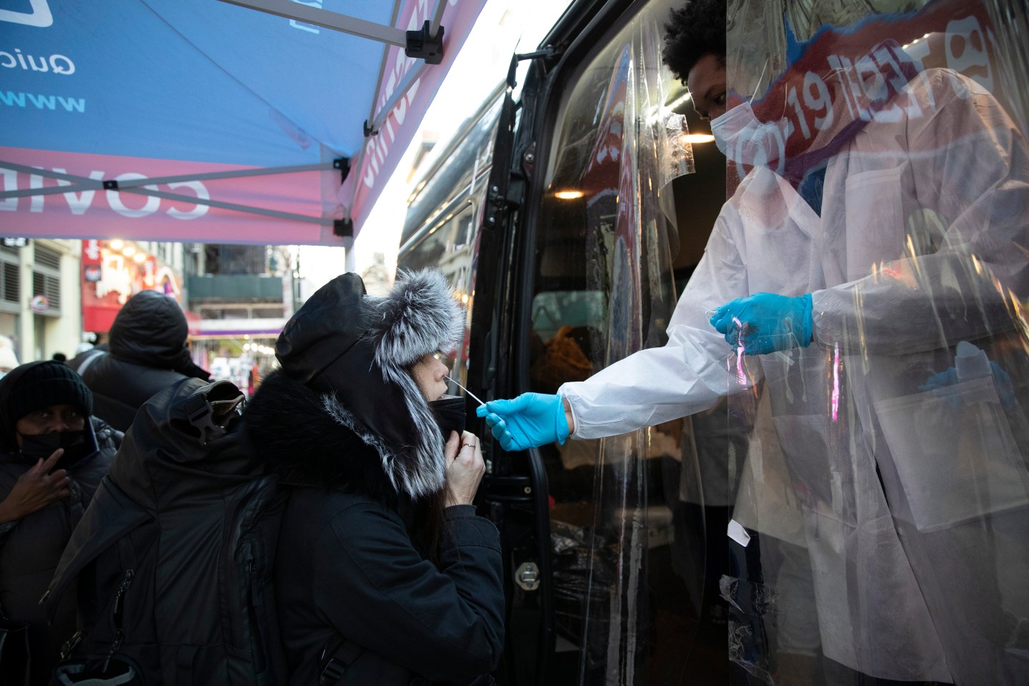 A woman getting a covid test.