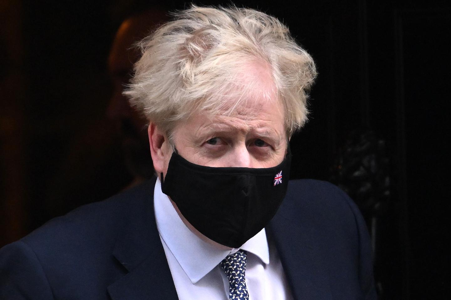 Prime Minister Boris Johnson leaves 10 Downing Street For PMQ's on January 12, 2022 in London, England.