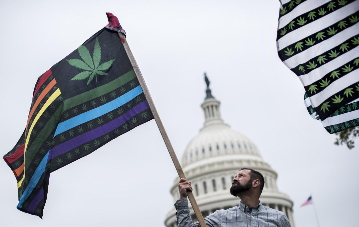 WASHINGTON, DC - Adam Eidinger along with other DC marijuana advocates gathered on the east side of the US Capitol plaza grounds to urge Congressional lawmakers to lower the restrictions on marijuana use in the District of Columbia, and made a further statement by illegally smoking marijuana and consequently being arrested, on Capitol Hill in Washington DC Monday April 24, 2017.