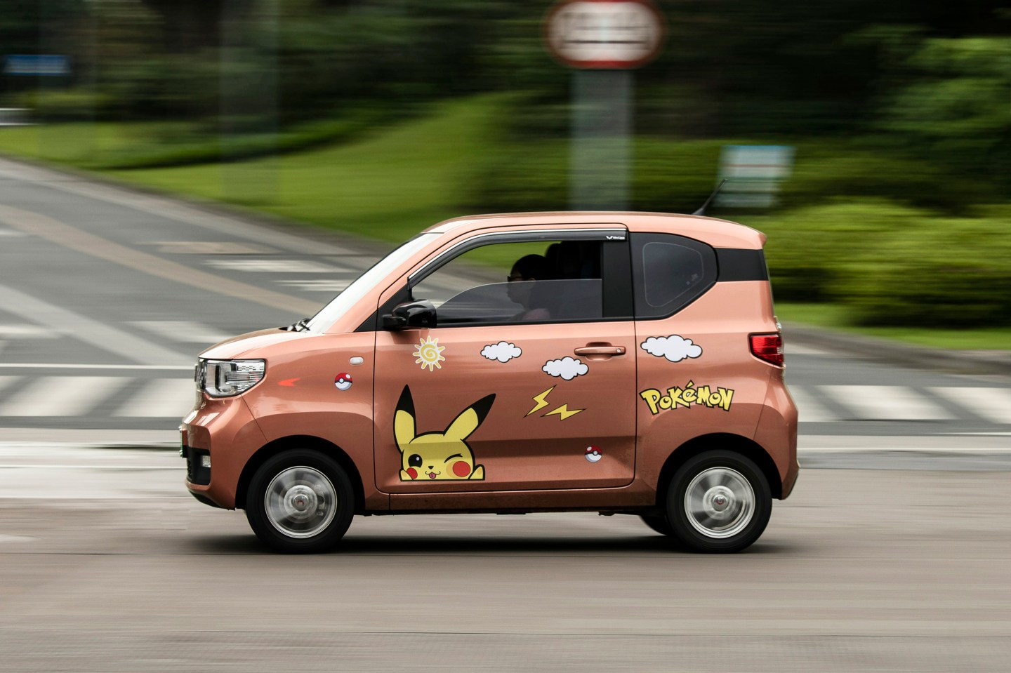A Pokémon-inspired Wuling Mini EV cruises along a road in Liuzhou, China, on May 17, 2021.