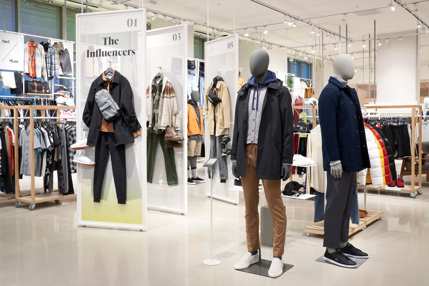 mannequins in a store wearing mens clothes