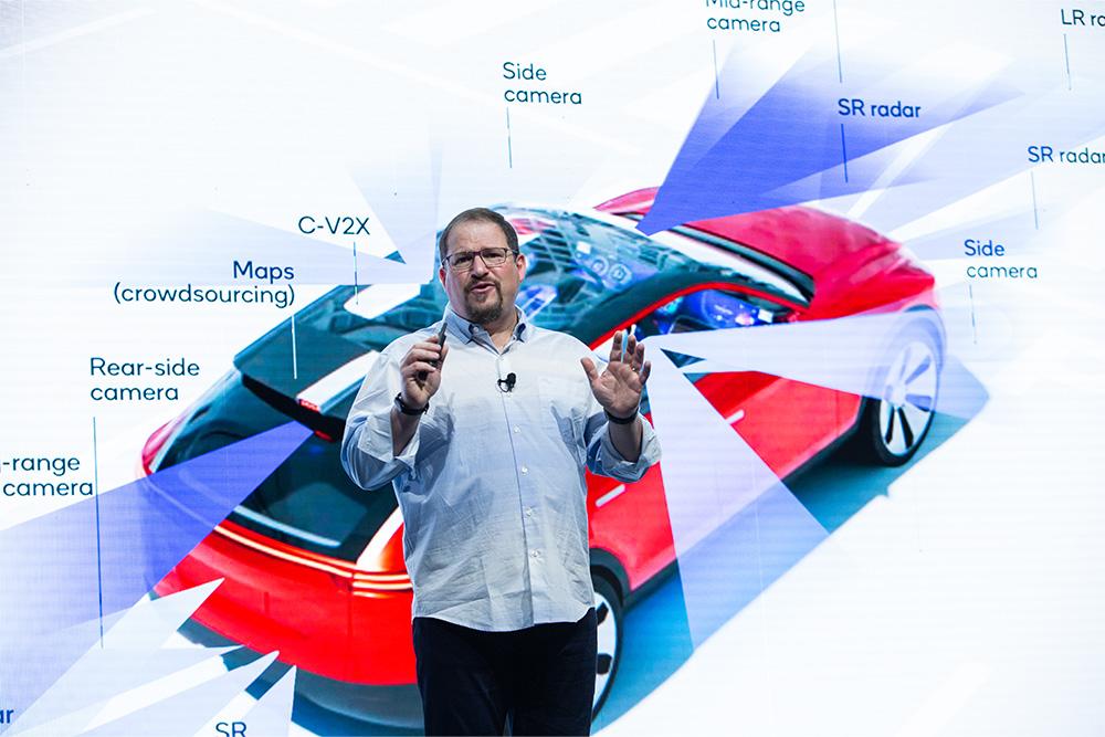 As cars become smartphones, Big Auto turns to handset chipmaker to survive
