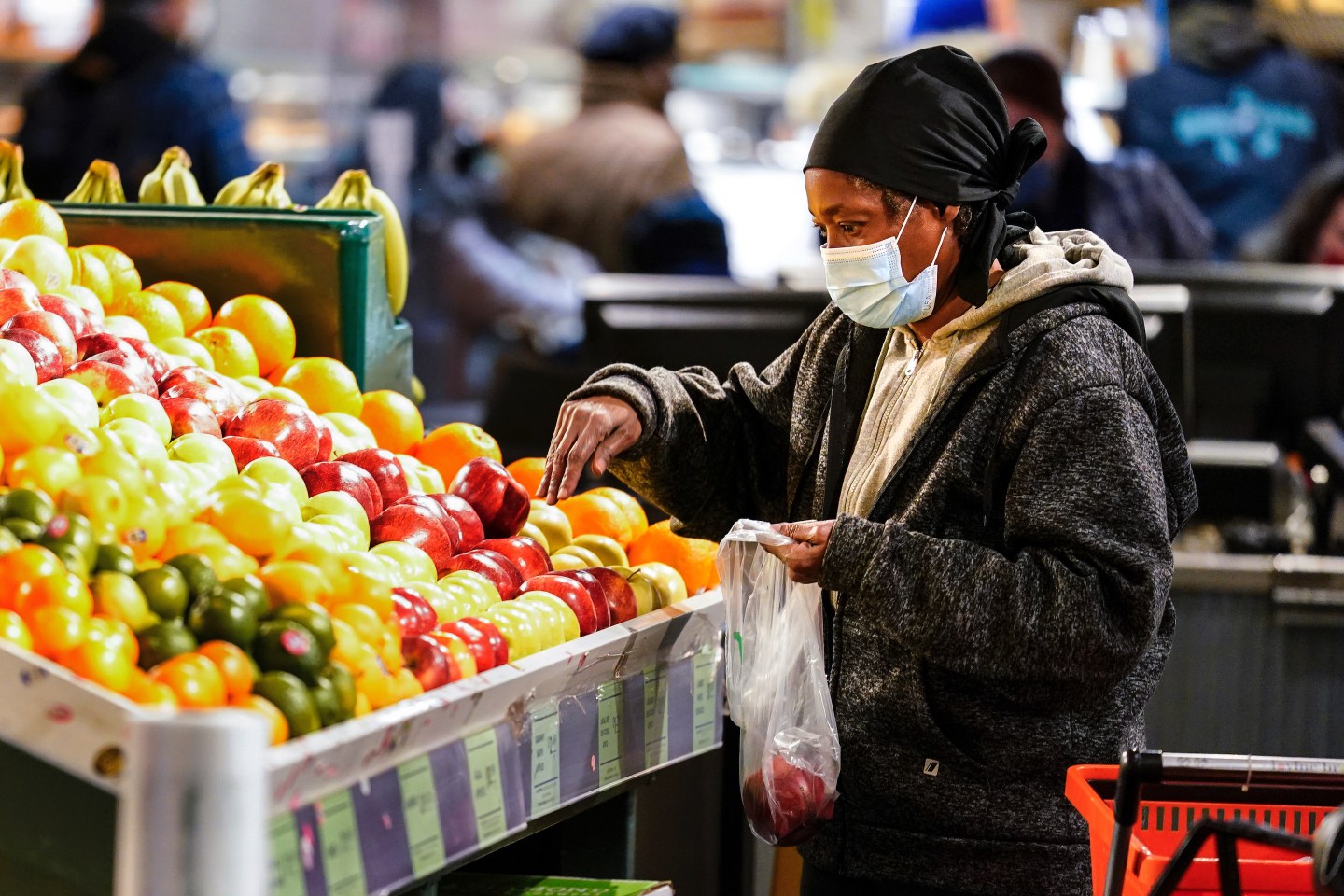 A shopper at a grocery store wearing a proactive mask