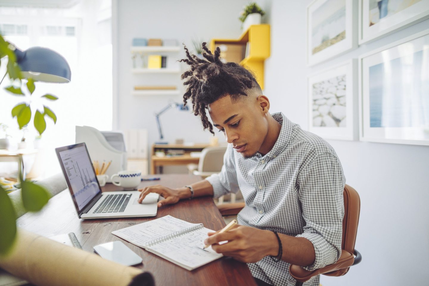 Young man working at home