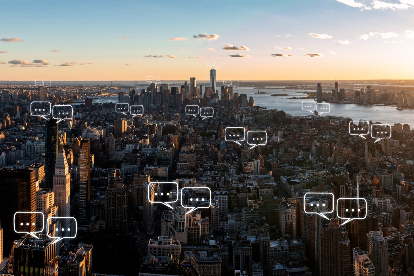 Bubble chat boxes above NYC skyline.