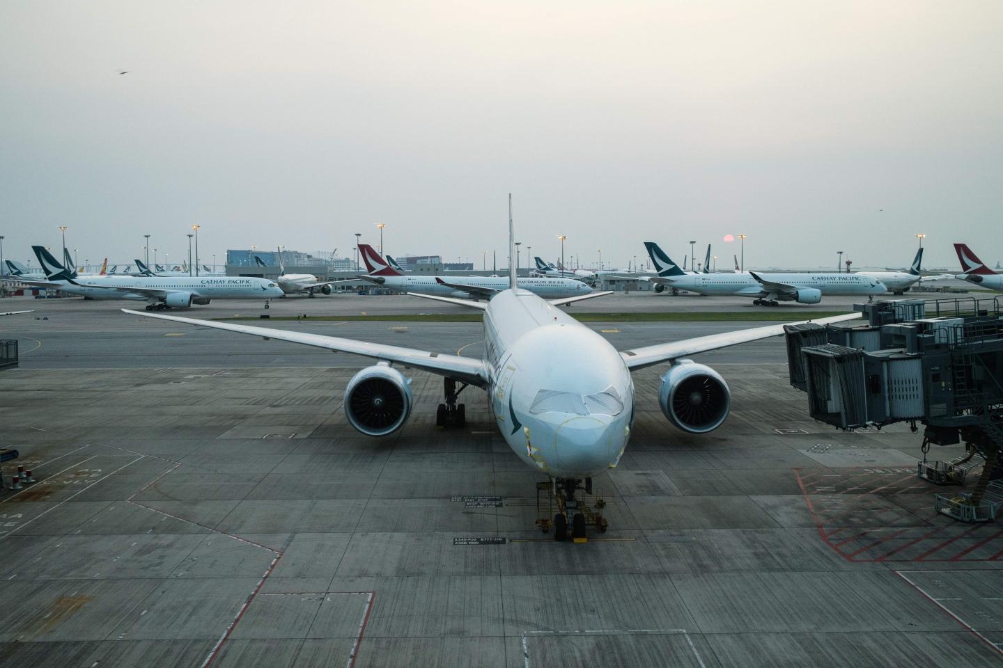 Travel restrictions and a pilot exodus had already decimated Cathay Pacific Airways. Then it became Hong Kong’s Omicron scapegoat