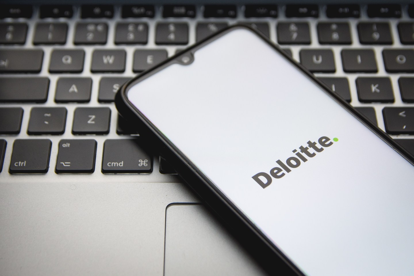 Deloitte logo seen displayed on a smartphone screen