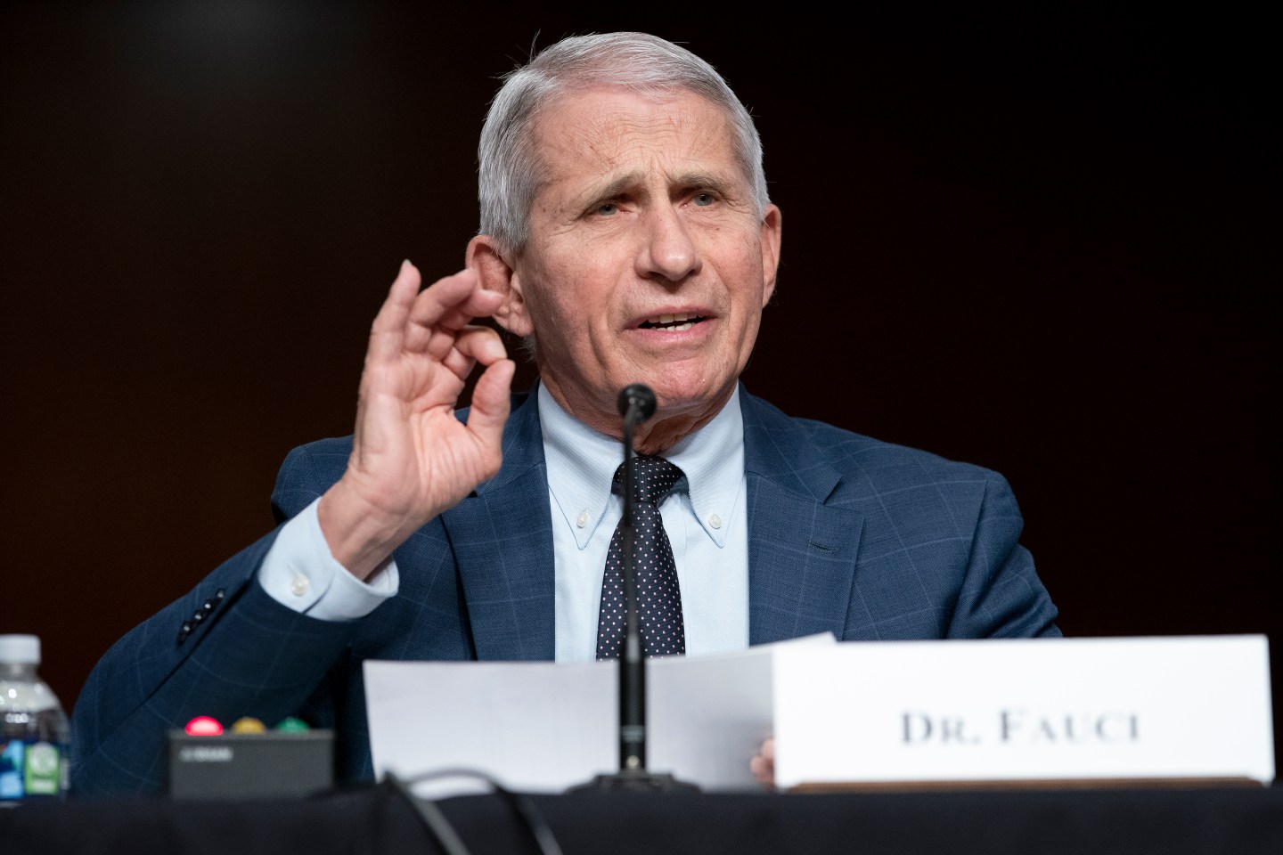 Covid-19 vaccines, drugs and tests are putting the U.S. in an improved position to pull back on restrictions such as masking that were enacted to limit the spread of the virus, White House medical adviser Anthony Fauci said.