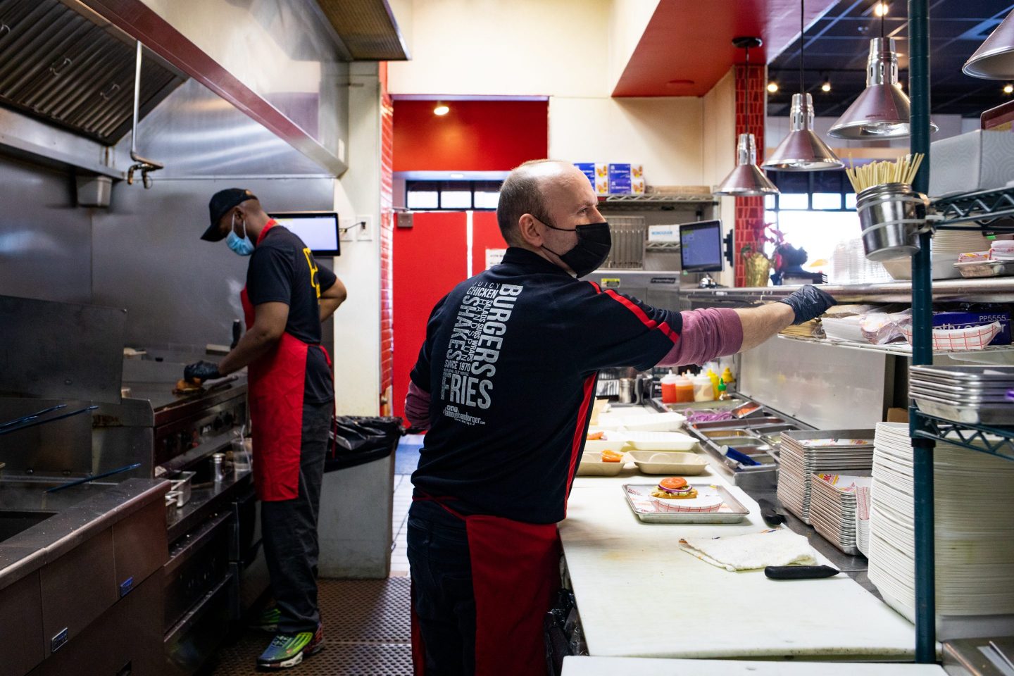 two workers at fast food chain