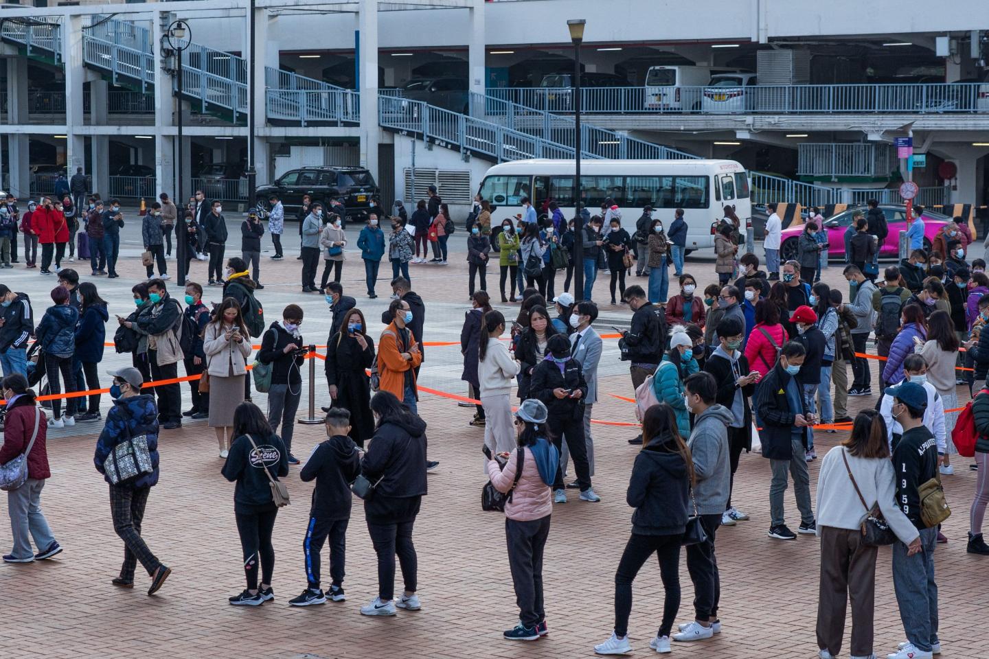 Live with COVID or lock down? Omicron is forcing Hong Kong to do a bit of both