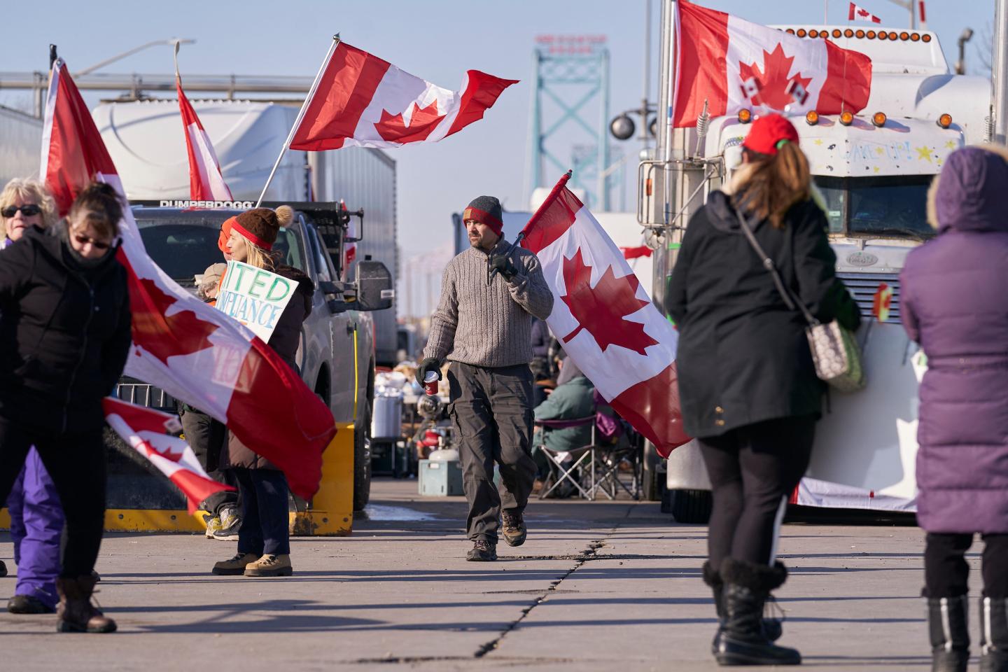 Protestors block roadway of the Ambassador Bridge border crossing in Winsdor