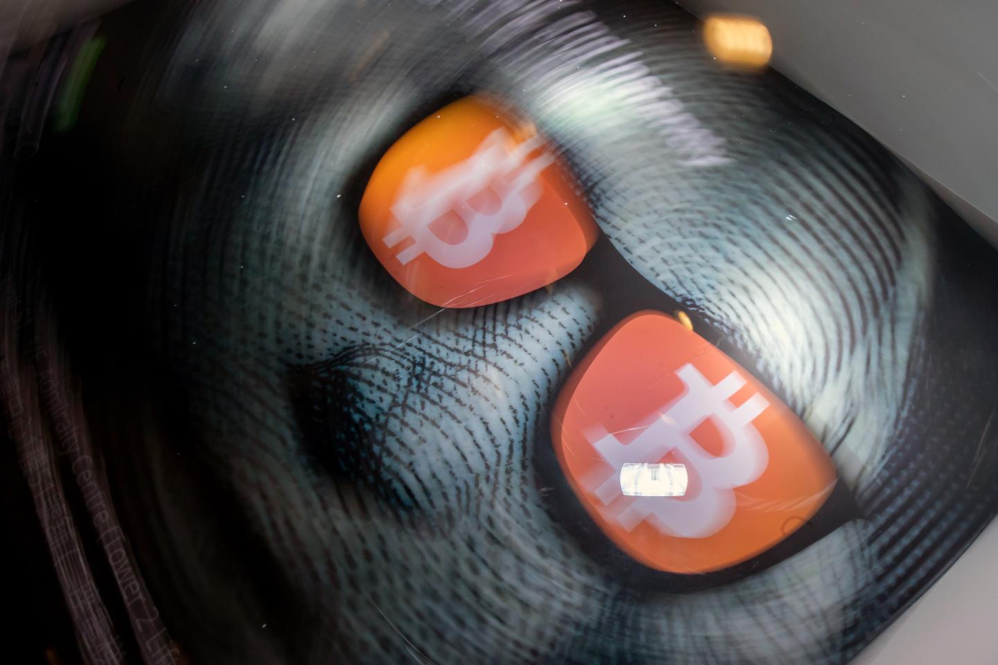 A display of cryptocurrency Bitcoin in Hong Kong, China, on Thursday, Feb. 10, 2022.