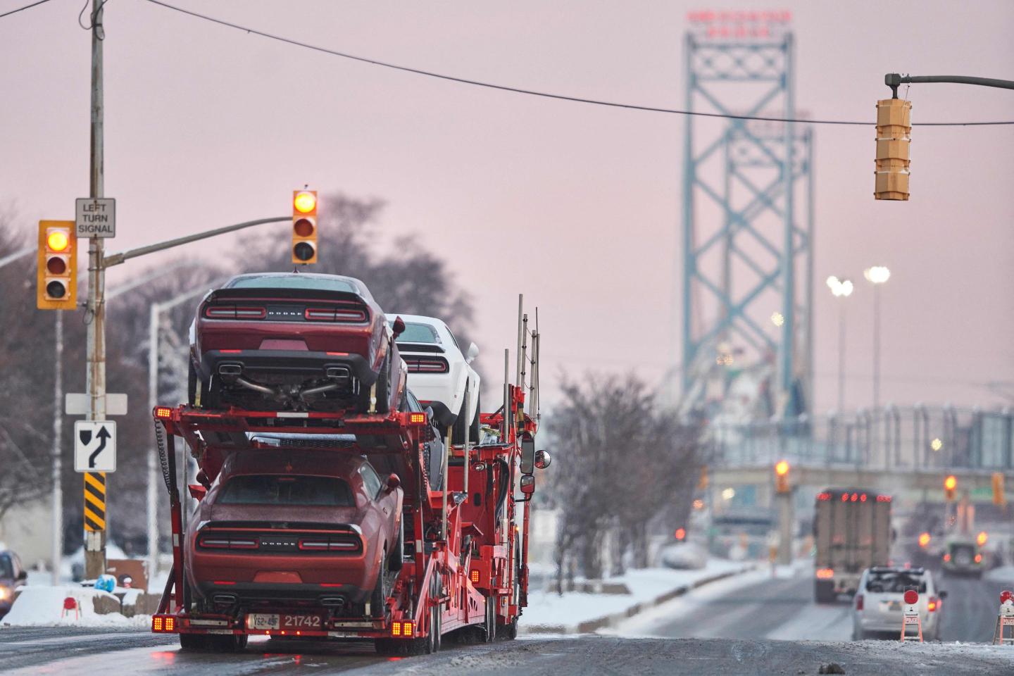 A car carrier trailer on a road.
