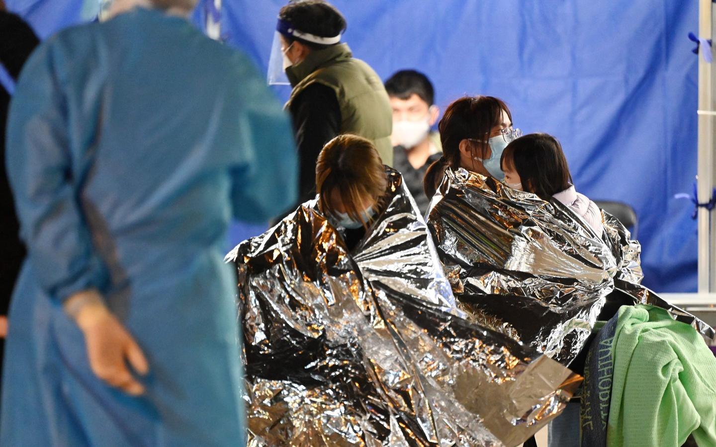Hong Kong insists on isolating every COVID patient. A massive outbreak means the crowded city is running out of space