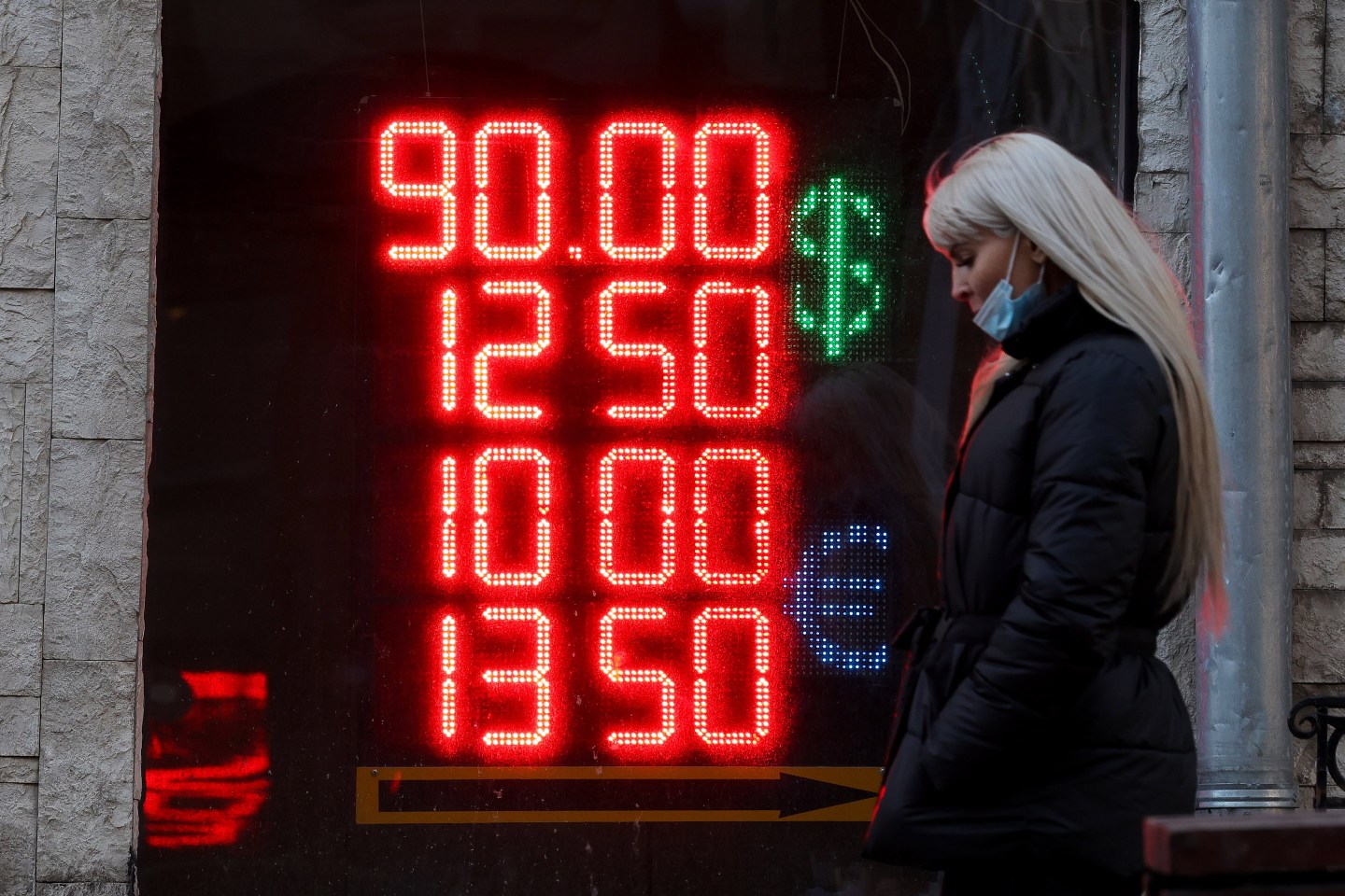 A sign displays foreign currency exchange rates to the Russian ruble at an exchange bureau in Moscow, Russia, on Monday, Feb. 28, 2022.